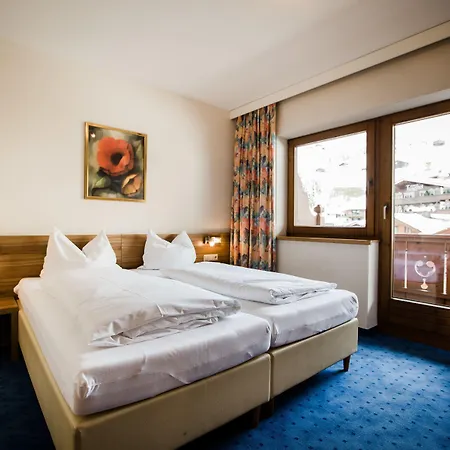 Dorfplatzl Garni & Hotel apartamentowy Tux